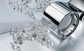 A close-up technical visual of diamonds being examined under laboratory conditions for the SGL's Advanced Diamond Charter program.